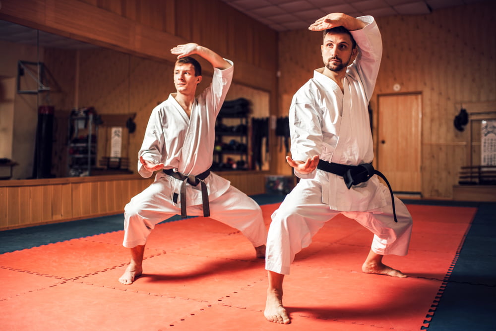 Two People With Black Belts