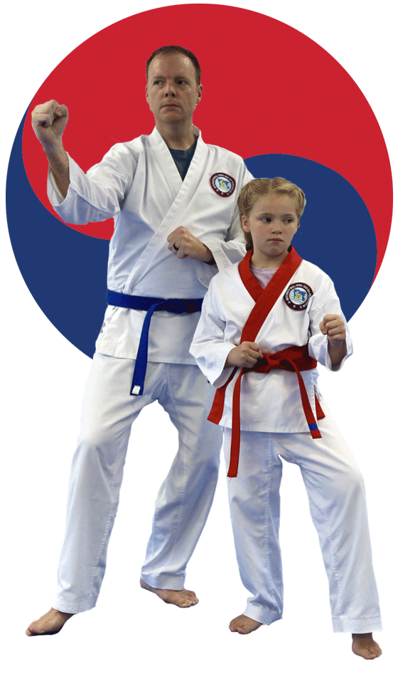 Master DuScheid and a young student standing in a karate pose in the background of a a red and blue taegeuk circle